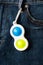 Bright yellow and blue toy antistress for children and adults. Flexible sensory antistress toy - popit, simple dimple.