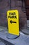 Bright yellow car parking sign outside church Liverpool March 2020