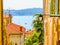 Bright yellow houses in the Villefranche-sur-Mer, of the Cote d`Azur, France