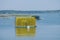 Bright Yellow lobster cages sit on a loading platform in Wills G