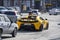 Bright yellow Mclaren sports race car with license plate student on the main street of Kiev Khreshchatyk , Ukraine