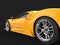 Bright yellow modern luxury sports car - rear wheel closeup shot