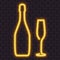 Bright yellow neon champagne bottle and glass