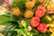 Bright yellow pincushion protea flowers Leucospermum in a tropical arrangement