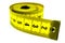 Bright yellow rolled measuring tape, on a white background, isolate