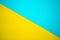 Bright yellow and sky blue cardboard background