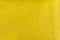 Bright yellow smooth leather texture background