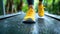 Bright yellow sneakers on a treadmill, surrounded by greenery.