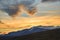 Bright yellow sunset over the higest swedish mountains in Sarek national park