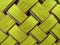Bright yellow texture squares in a wicker basket background