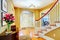 Bright yellow and white entrance hall
