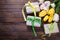 Bright yellow and white spring tulips and boxes with presents on