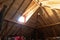 Brighten attic with wooden planks and light source at window