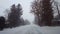 *Brighter Version* Driving Winter Snow Storm on in Residential Suburb in Day.  Driver Point of View POV Snowing Blizzard Snowfall