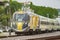 Brightline high speed train departing Fort Lauderdale FL