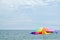 Brightly colored coloured beach umbrella