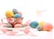 Brightly colored eggs in tea cup
