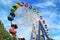 Brightly colored Ferris wheel against the sky