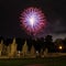 Brightly colorful fireworks colors in the night sky