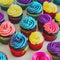Brightly coloured cupcakes