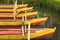 Brightly coloured traditional Balinese wooden canoes in a lake w