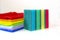 Brightly multicolored cleaning sponges and rags on white background