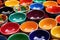 brightly painted ceramic bowls in an array