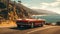 Brightly painted classic vintage car drives along a coastal road