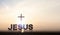 The brightly rising New Year\\\'s sunrise and the cross of Jesus Christ and JESUS