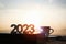 The brightly rising sun, the 2023 New Year\\\'s sunrise, and books and coffee