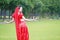 Brightness of dance Asian Chinese belly dancer in red dress