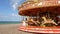 Brighton: carousel on beach panorama