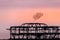 BRIGHTON, EAST SUSSEX/UK - JANUARY 26 : Starlings over the derelict West Pier in Brighton East Sussex on January 26, 2018