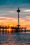 Brighton jetty with people silhouettes