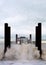 Brighton West pier, crashing wave, starlings murmurating