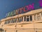 Brighton word in rainbow colours lights east sussex peir blue sky and seagull