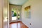 Brightt hallway with glass entrance door