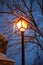 Brihuega, Spain - January 9, 2021: An icicle hangs from a lamppost after the Filomena snow storm in the town of Brihuega (Spain