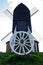 Brill, United Kingdom - 06 March 2020: Brill Windmill on top of the hill facing the sun, British 17th century mill, nice sunny