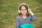 Bring music to life. Little child listen to music with closed eyes. Small girl wear headphones playing music. New