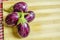 Brinjal, Eggplant, or  Aubergine, on Wooden Background