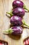 Brinjal, Eggplant, or  Aubergine, on Wooden Background