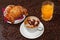 Brioches e cappuccino and juice