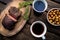 brisket and stout shot from a birds-eye view on an outdoor table