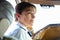 British Airways Middle Aged Female Captain Pilot in an Airplane cabin