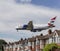 British Airways plane landing over houses