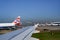 British Airways planes in line on ground in Heathrow Airport. British Airways aircrafts with Union Jack on tail.