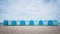 British blue beach houses near Charmouth in Dorset, UK