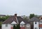 British brick terrace houses and grey sky on a rainy day.