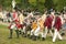 British fife and drum marches on Surrender Road at the 225th Anniversary of the Victory at Yorktown, a reenactment of the siege of